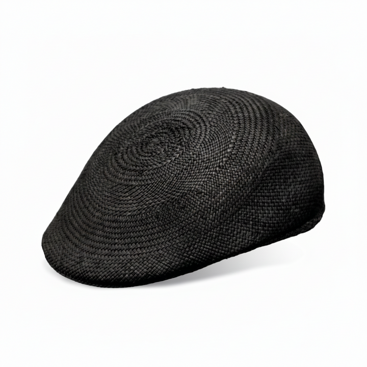 Black flat cap on a white background